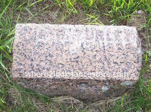 headstone is nearly impossible to read