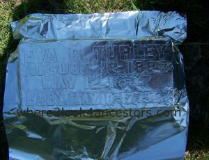 foil and a soft pencil eraser brought out the engraved words